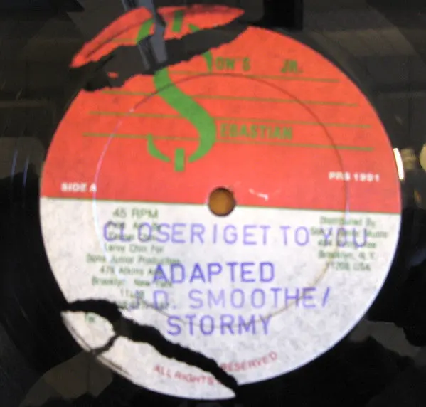 J.D. Smoothe / Stormy (4) / Positive (8) - Closer I Get To You B/W Here We Go Again (12") (Vg+) 1